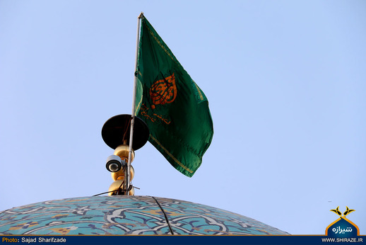 آیین تعویض پرچم گنبد حرم مطهر شاهچراغ(ع)